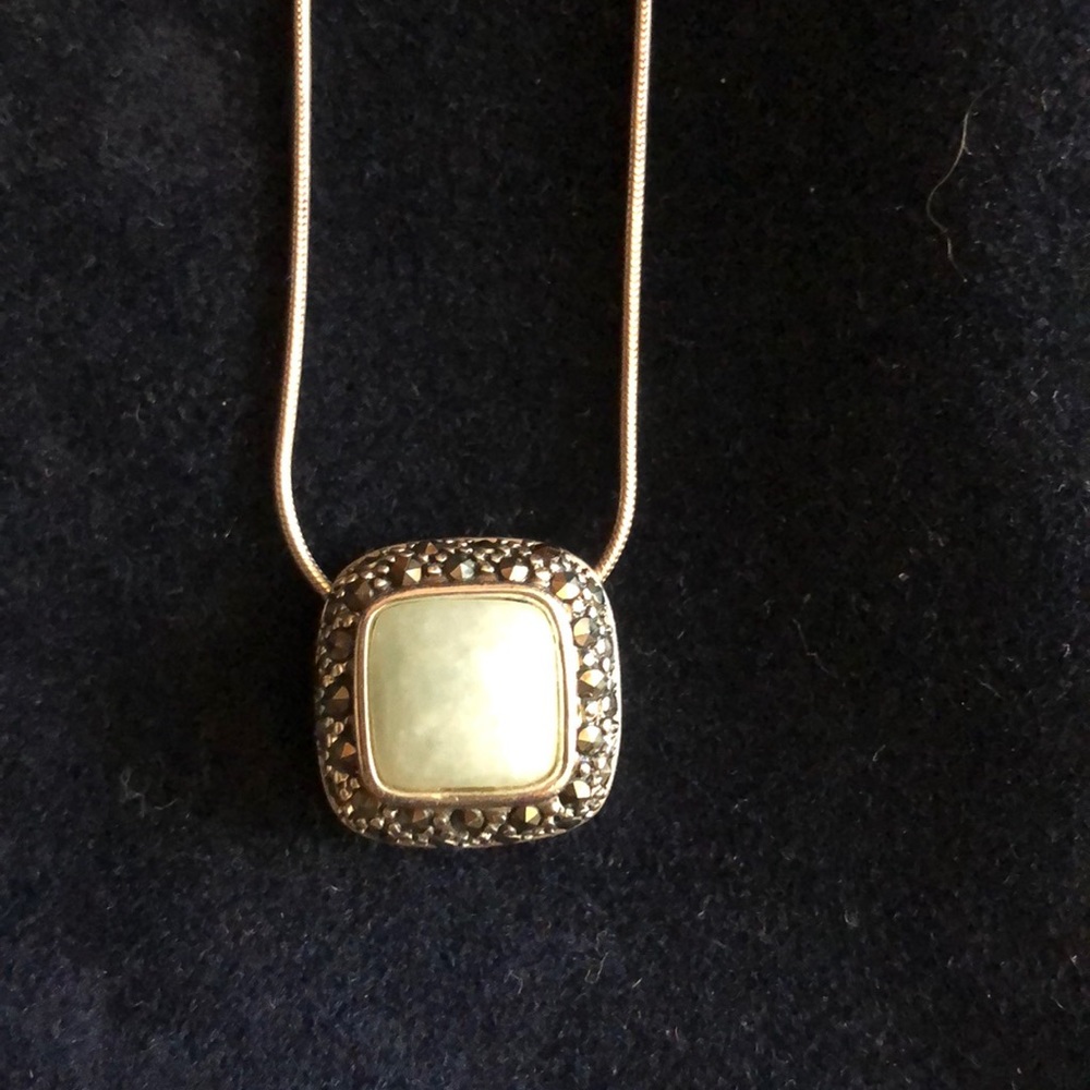 Green stone in Marcasite halo. Silver necklace